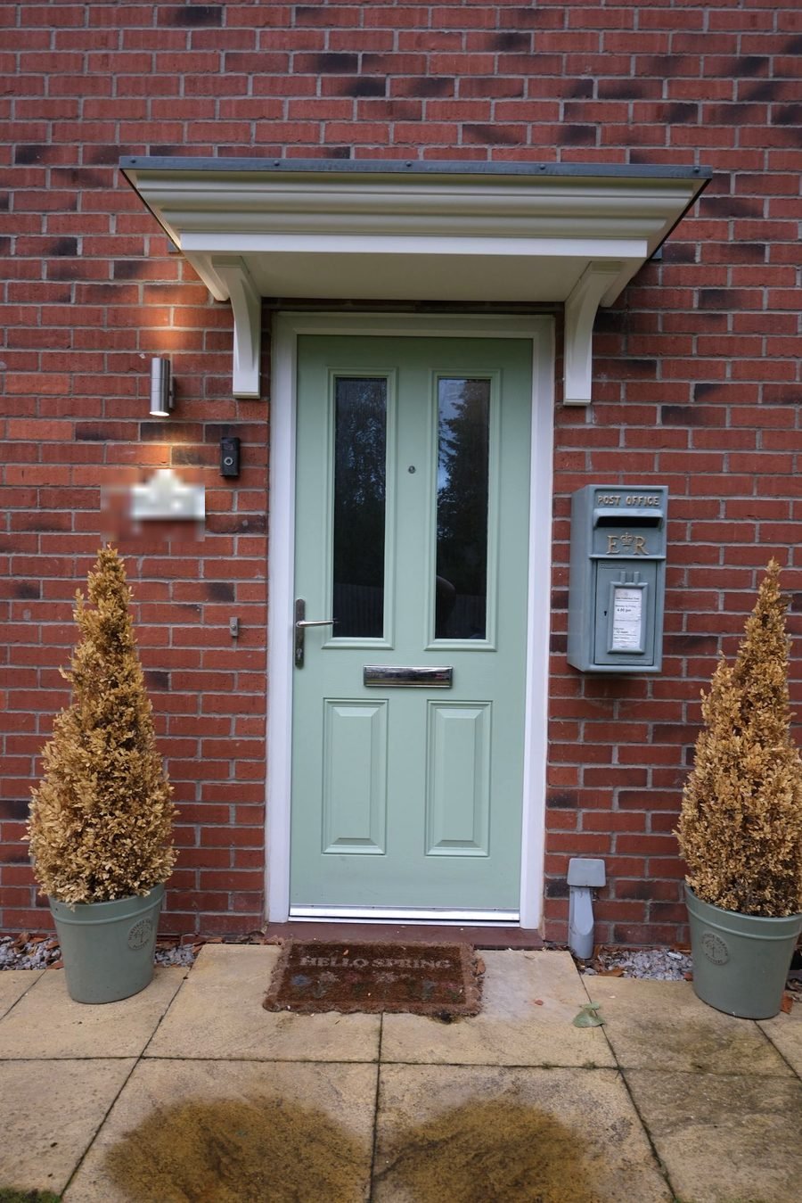 Repainted front door, frame and canopy at a private home in York