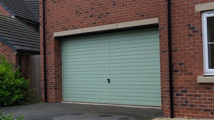 Repainted garage door and frame at a private home in York